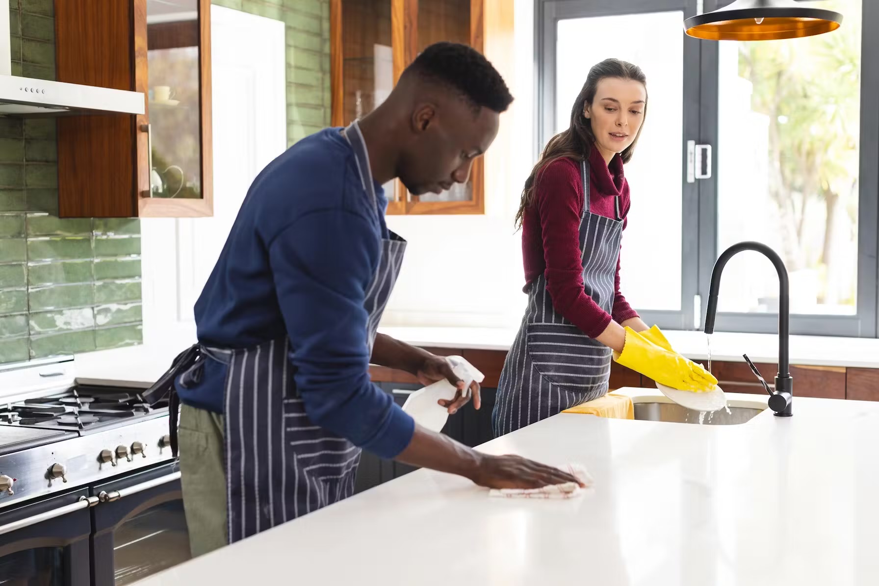Professional WAAH cleaning team working in a modern kitchen